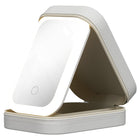 Lighted travel makeup mirror in a grey faux leather protective carrying case