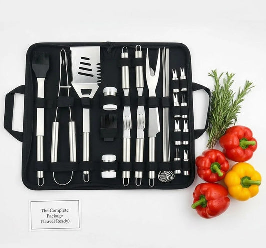 Complete stainless steel BBQ tool set in a black travel carrying case with red and yellow peppers.