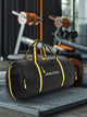 Black and yellow Nautica gym duffel bag placed in a fitness center gym setting
