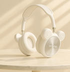 White Oraimo wireless over-ear headphones with cute animal-ear design on a marble table.