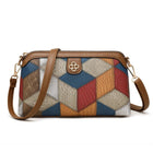 Multi-color geometric patchwork crossbody bag with brown leather strap
