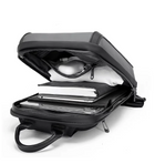 Open black laptop backpack showing interior compartments with a laptop and notebook