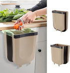 Wall-mounted beige kitchen trash can with a removable liner for food waste disposal.