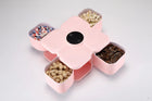 Pink flower-shaped snack storage organizer with compartments for nuts and seeds