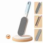 Nestora double-sided pet hair remover brush on white background
